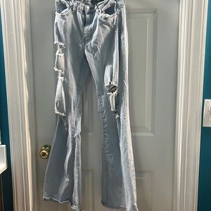 Light Wash Mid Rise Ripped Flare Jeans